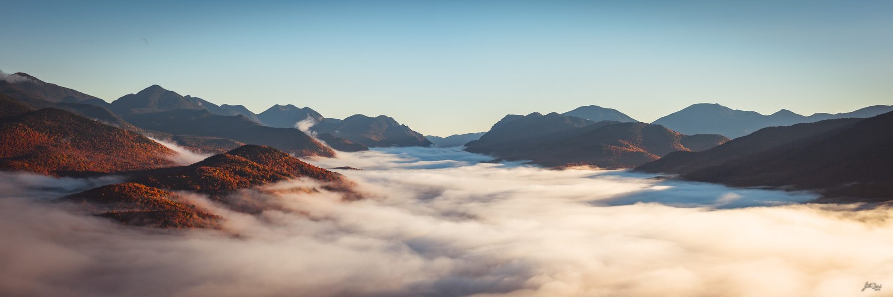 Autumn High Peaks Above the Clouds